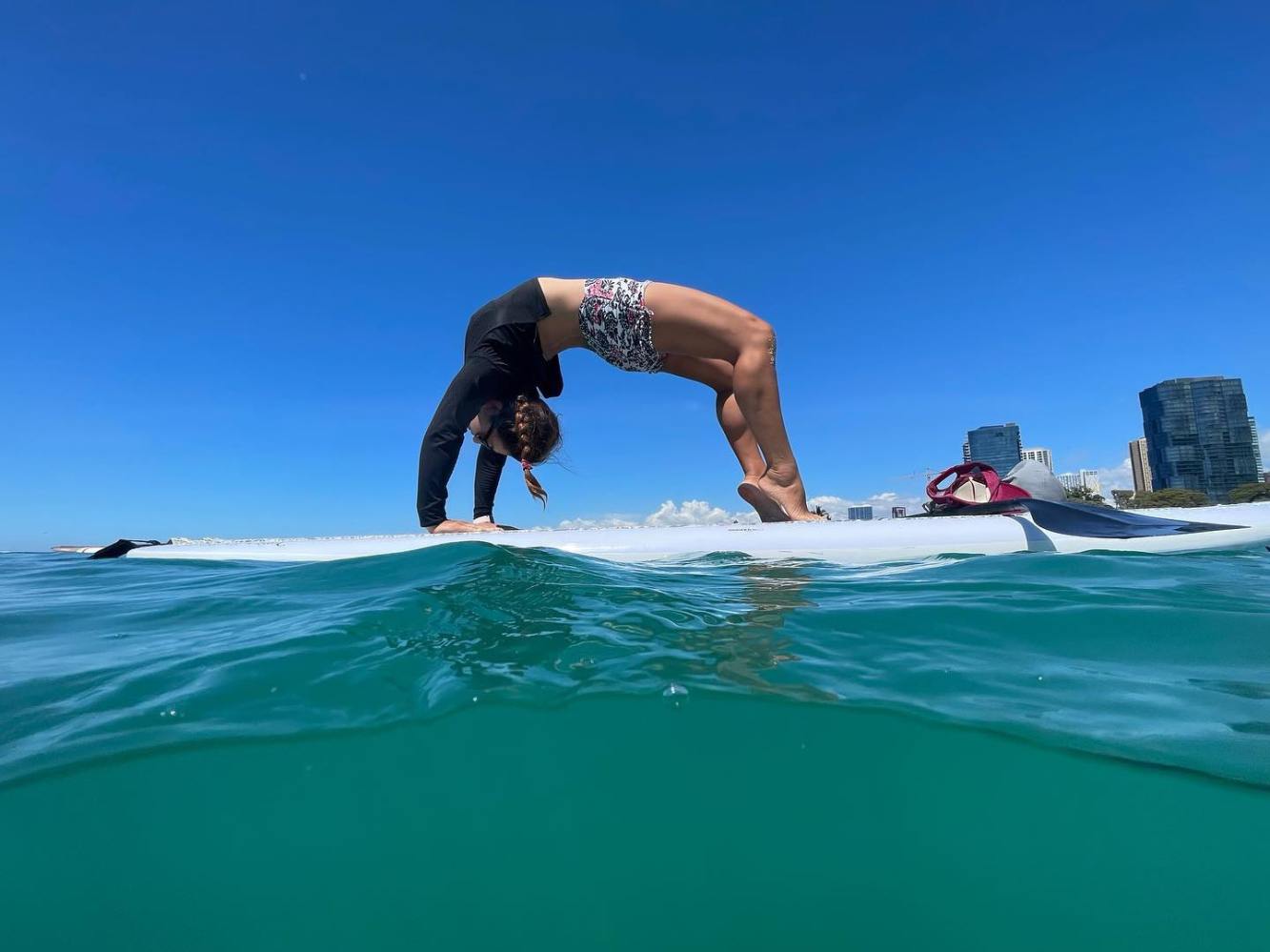 a man riding a wave on top of a body of water