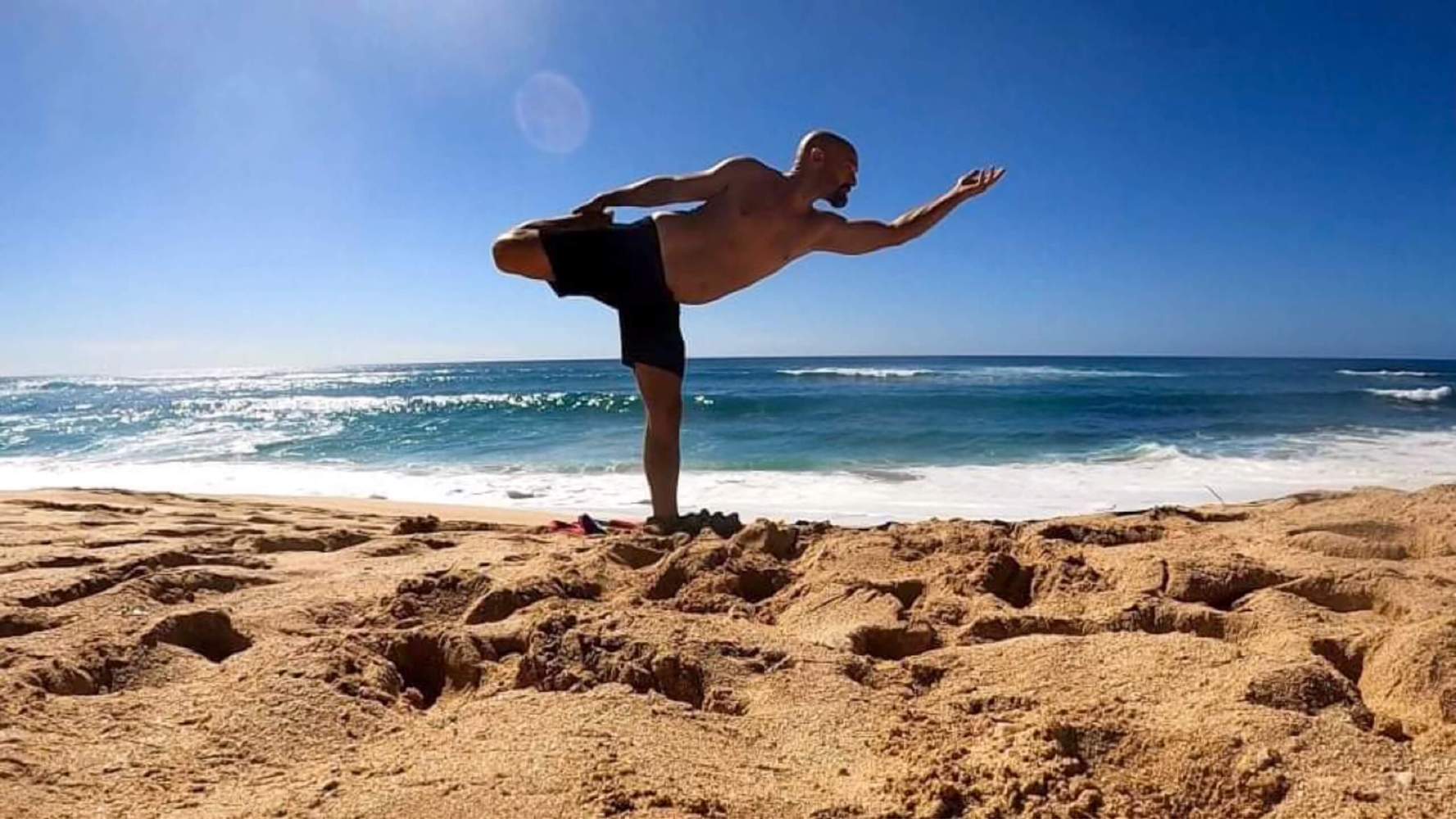 a man standing on a beach